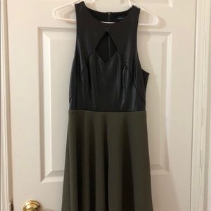 Black leather and green dress